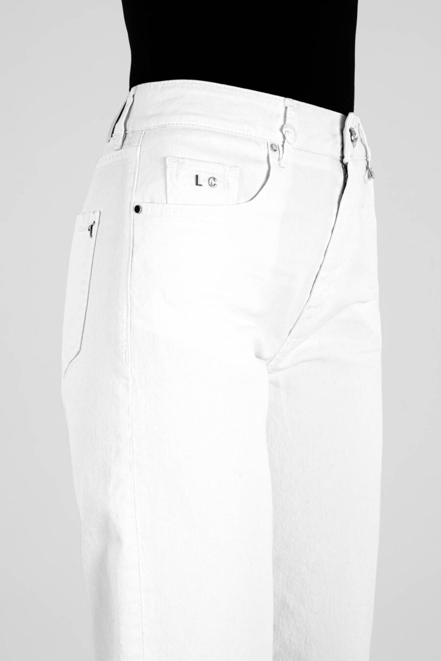 MONICA FLARE CUT PANTS IN WHITE COTTON BULL - Image 8